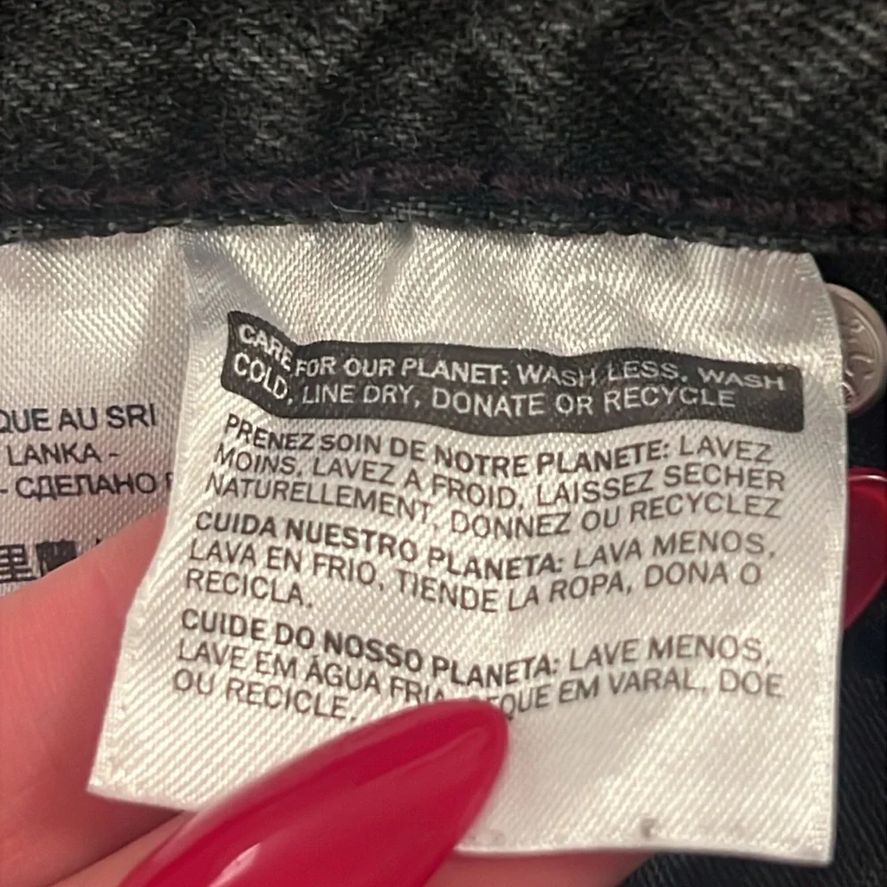 Levi’s High Rise Raw Hem Denim Mini Skirt Black 24